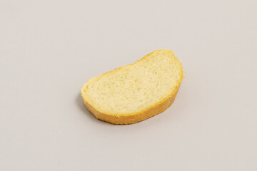 Slice of wheat and rye bread isolated on a grey surface