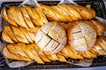 Fresh fragrant breads on the table. Bakery food concept panorama or wide banner photo background