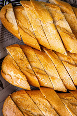 Fresh fragrant breads on the table. Bakery food concept panorama or wide banner photo background