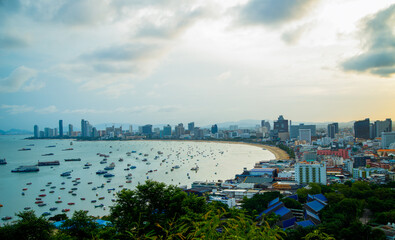 Best panoramic view of Pattaya skyline from Pratumnak hill, Thailand with view of Pattaya city skyline, blue sky and beach