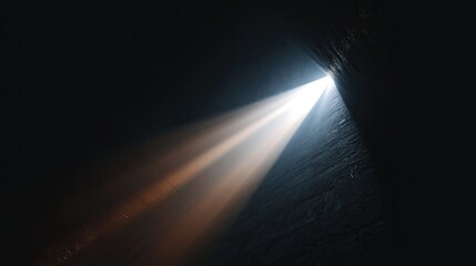 Light beam piercing dark cavern
