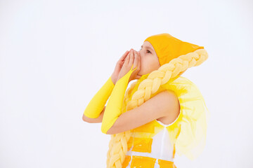 Cheerful girl in yellow corn costume having fun, dancing and laughing on light background with funny expression in empty space. Great promo video for announcement sharing news. Sale