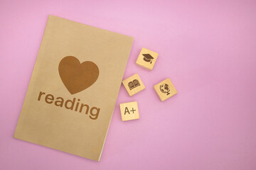 Education and Reading Icons with Heart Notebook
