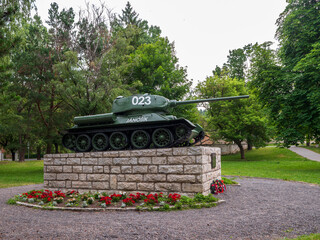 Soviet T-34 tank monument named “Jánošík” in Kežmarok, Slovakia. Installed in city park in...