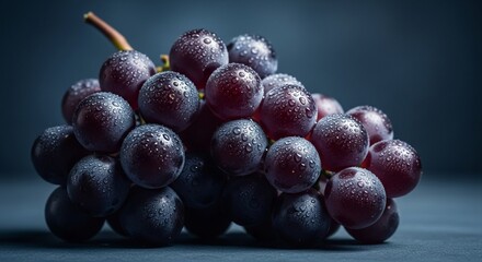 Fresh Dark Purple Grapes with Dewy Water Drops on a Moody Background