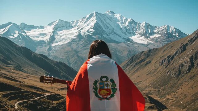Young woman traveler with a Peruvian flag and guitar looking at the majestic snow-capped Andes mountains in Peru. Travel and adventure concept.