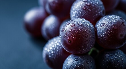 Fresh Dark Purple Grapes with Dewy Water Drops on a Moody Background