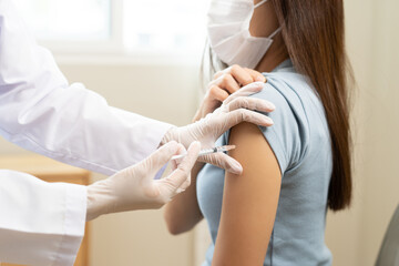 Health care, corona virus, hand of woman nurse, doctor giving syringe vaccine, injection dose on...