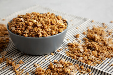 Healthy Homemade Toasted Muesli with Nuts in a Bowl, side view. Close-up.