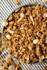 Healthy Homemade Toasted Muesli with Nuts in a Bowl, top view. Close-up.
