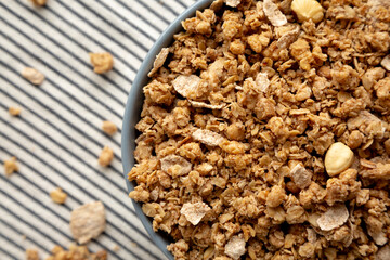 Healthy Homemade Toasted Muesli with Nuts in a Bowl, top view. Close-up.
