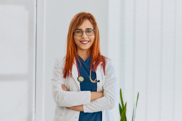 Nurse, hospital employee and portrait of female doctor in a healthcare, wellness or clinic. Happy,...