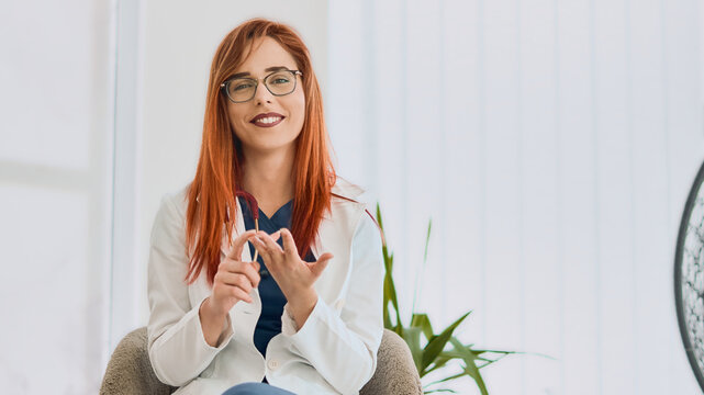 Female doctor make online telemedicine video call,consulting with patient. White woman therapist talking to camera in remote videoconference chat. Webcam view, face headshot