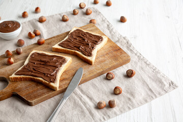 Homemade Chocolate Hazelnut Toast, side view. Copy space.