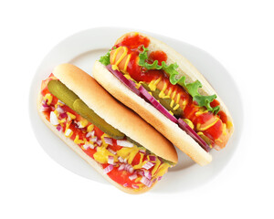 Tasty hot dogs with vegetables, mustard and ketchup isolated on white, top view