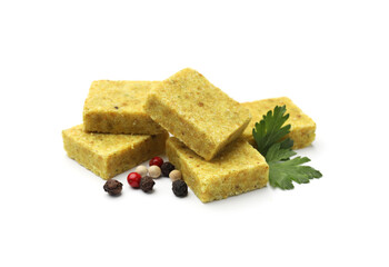 Aromatic bouillon cubes, parsley and peppercorns isolated on white