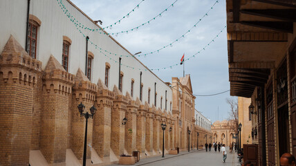 Discovering Baghdads historic architecture and lively streets at dusk