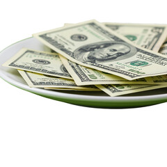 Isolated Photo of Money on Plate with Black Background