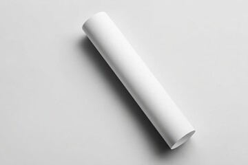 Top-down view of a rolled blank white A3 poster placed diagonally on a smooth light gray background, minimalistic and clean studio lighting
