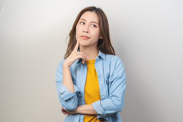Thinking with problem, frustrated asian young woman, girl expression face thoughtful, brunette hair...