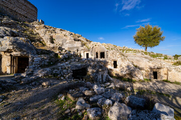 Tlos was an ancient Lycian city near the modern town of Seydikemer in the Mugla Province of southern Turkey, some 4 kilometres northwest of Saklikent Gorge. Tlos ancient city and amphitheatre Fethiye