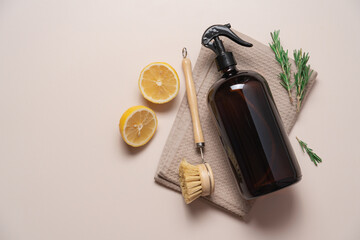 Eco-friendly cleaning product with lemon and rosemary on beige background with copy space. Zero...