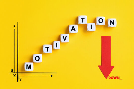 Visual Representation of Declining Motivation A Conceptual Graph with Falling Blocks Spelling Motivation and a Downward Arrow on a Bright Yellow Backdrop