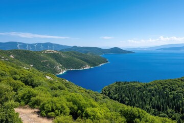 Scenic coastal landscape with clear blue sky and wind turbines