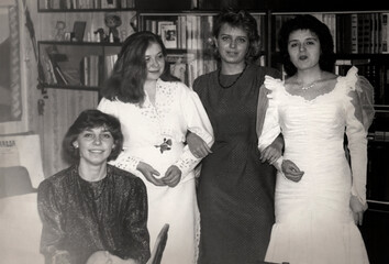 Dnepropetrovsk, USSR - November 14, 1992: Vintage portrait of the bride and her bridesmaids before...