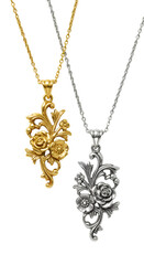 Two Pendants Gold And Silver Rose Design on Black Background
