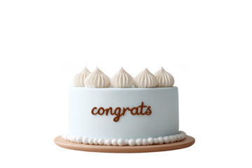 A white frosted cake decorated with five meringue peaks and the word "congrats" written in brown icing on the side.