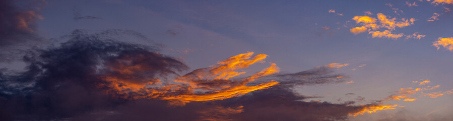 dark blue and orange cloud at sunset, background panorama