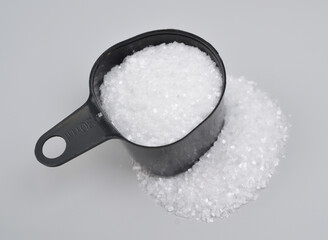 Sodium cyclamate is an artificial sweetener on grey background