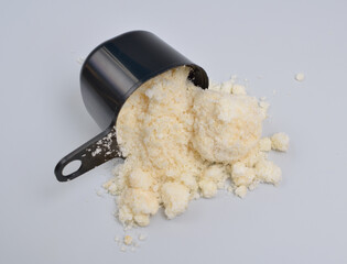 Sodium Oleate powder on light grey background.