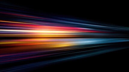 Abstract digital art with colorful light streams creating a sense of speed and motion against a dark background.