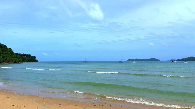 Beautiful view from Kao Khad next to Cape Panwa on the island of Phuket Thailand. Views of the turquoise Blue waters of the Andaman Sea and small islands off the coat of Phuket