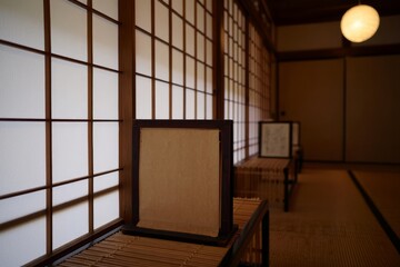 Traditional japanese shoji screen room with tatami flooring and soft lighting