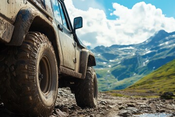 Off-road SUV climbs snowy mountain trail