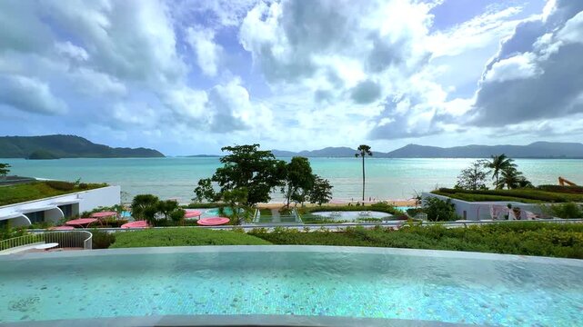 Beautiful view from Kao Khad next to Cape Panwa on the island of Phuket Thailand. Views of the turquoise Blue waters of the Andaman Sea and small islands off the coat of Phuket