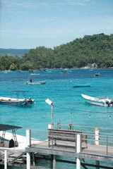Tranquil Tropical Seascape: Boats at a Calm Island Bay