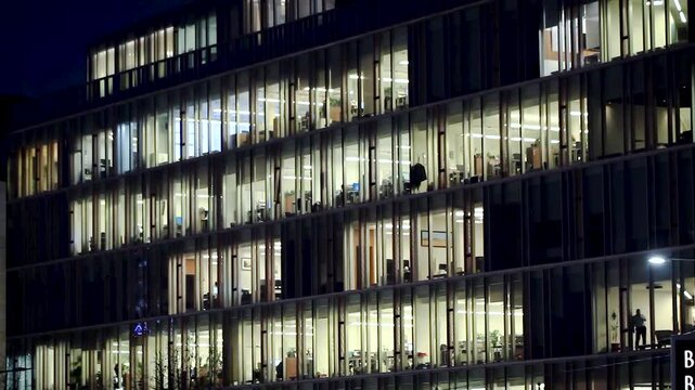 Office windows at night corporation night work business environment economy