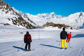 People enjoy ski and snowboard for winter holiday in Alps area, Les Arcs 2000, Savoie, France,...