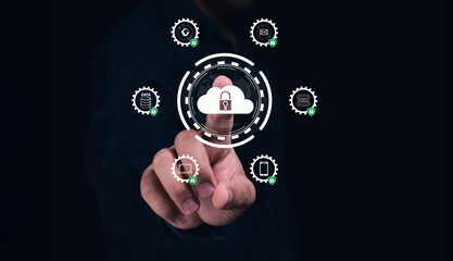 A hand interacts with a futuristic digital interface featuring cloud security and data protection...