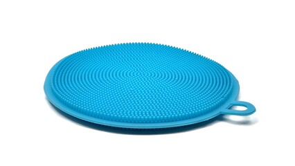 Closeup view of a multipurpose silicone dish sponge with a flexible, durable design, ideal for scrubbing dishes and cleaning surfaces, isolated on white background.