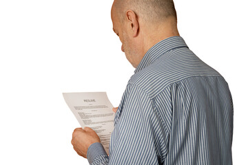 A man reading a resume