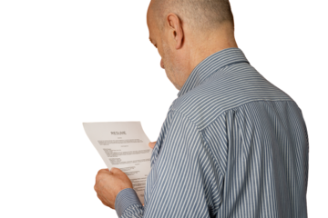 A man reading a resume