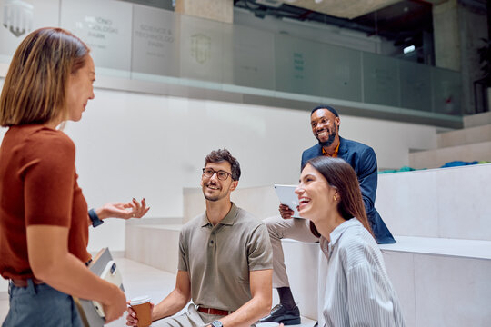 Business team enjoying a productive meeting, exchanging ideas and working together in a contemporary office environment