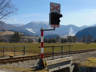 Railway crossing with mountains in the background in Slovakia