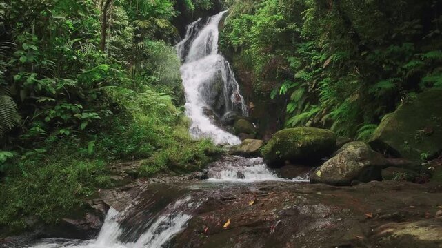 Video 4K: Scenic Waterfall Sawer Malasari West Java Surrounded by Lush Greenery with Cascading Stream