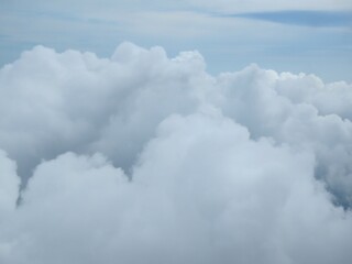 A vast sea of clouds seen from an aerial perspective. A clean background for concepts of digital...